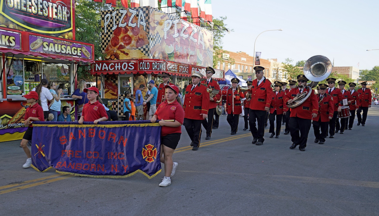 The Sanborn Volunteer Fire Company marches in last year's Canal Fest parade. (File photo)